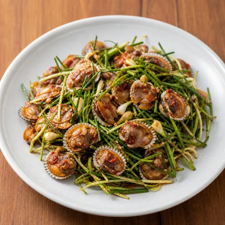 Kerang Dara dengan Kucai Liar