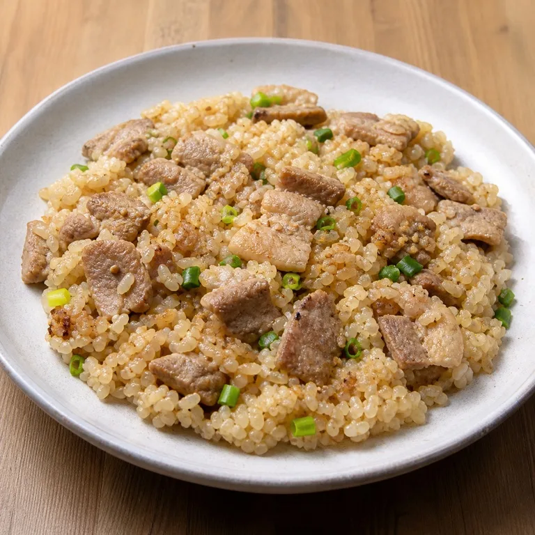 សាច់ជ្រូកនិងអង្ករដំណើប
